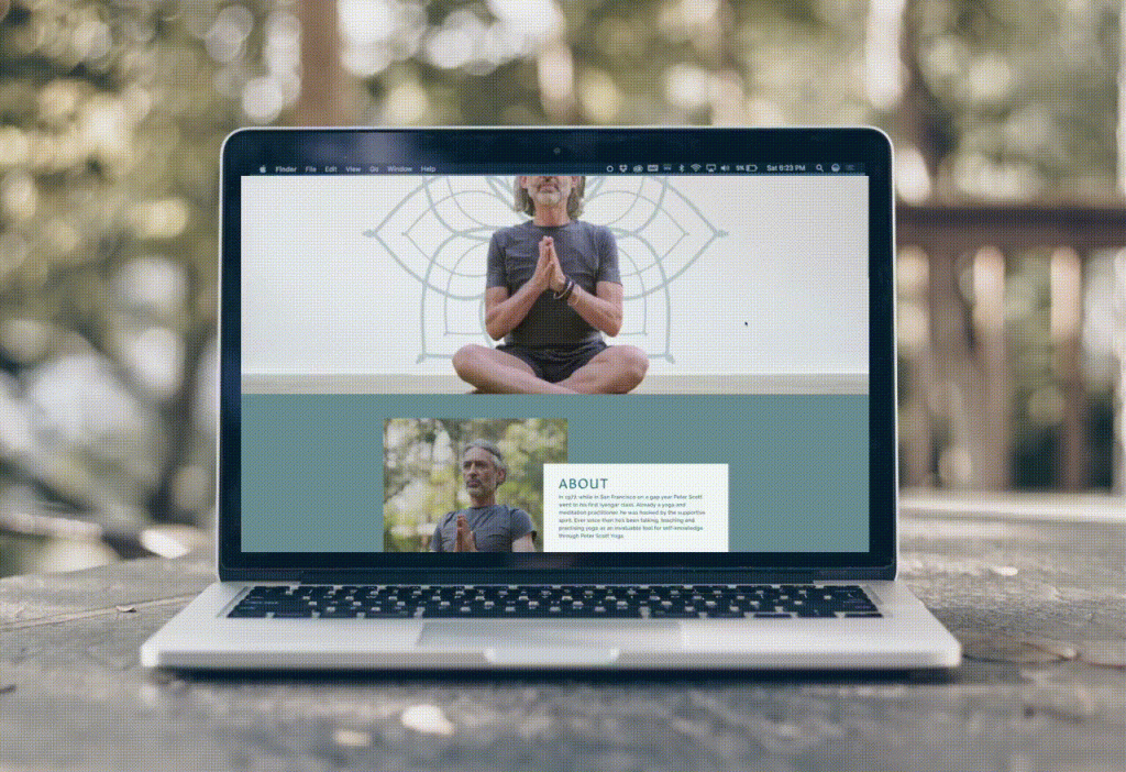 Scrolling image of Peter Scott Yoga website on a laptop